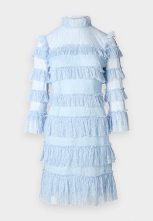 Light blue lace dress with layered ruffle details. Features a high neck and long sleeves, creating a textured and structured appearance.