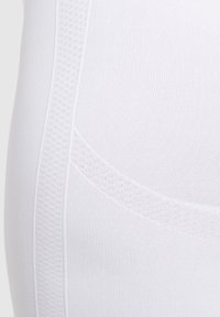 Smilodox CETRINA SEAMLESS SCRUNCH LEGGINGS - Tights - weiß