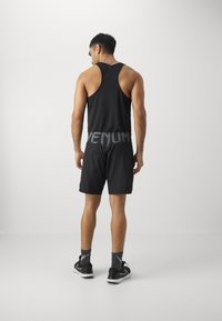 Venum RAPID FIGHTSHORTS - Sport rövidnadrágok - black/white