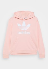 Ljusrosa huvtröja med en vit Adidas-logga och tre ränder på loggan, med en framficka och ribbade ärmslut.