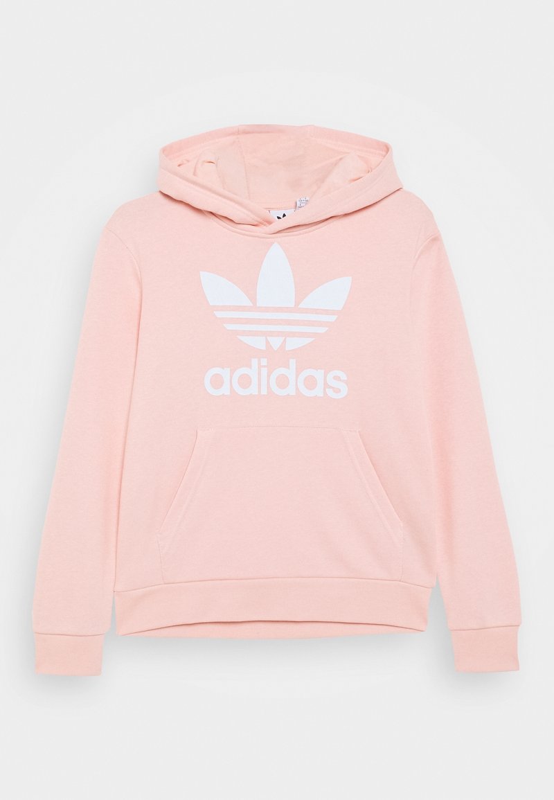 Světle růžová mikina s kapucí, na které se nachází bílé logo Adidas a tři pruhy na logu, s přední kapsou a žebrovanými manžetami.