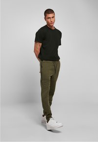 Southpole SIDE ZIPPER TECH JOGGER - Treniņtērpa apakšdaļas - olive