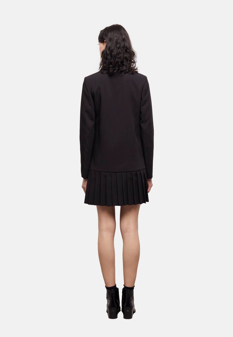 Robe courte habillée noire col montant | The Kooples