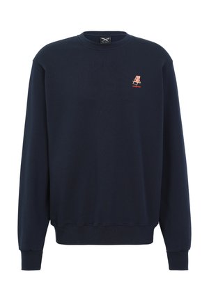 Navy blue crewneck sweatshirt with long sleeves, ribbed cuffs and hem, featuring a small red and white striped emblem on the left chest.