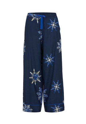 Navy wijde broek gemaakt van zachte stof, met kleurrijke sneeuwvlokpatronen in wit, blauw en geel, en een gestrikt middel.