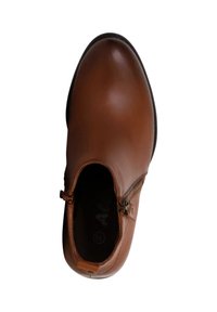 Bruine leren enkellaars met een gladde textuur, ritsluiting aan de zijkant en een ronde neus. Aan de binnenkant is er een contrasterende voering.