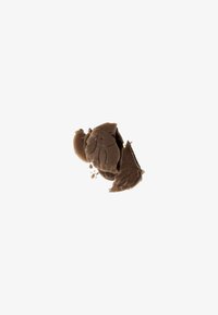 Brown modeling clay with a smooth, matte texture. Pieces showcase uneven edges and a slightly glossy surface where broken.