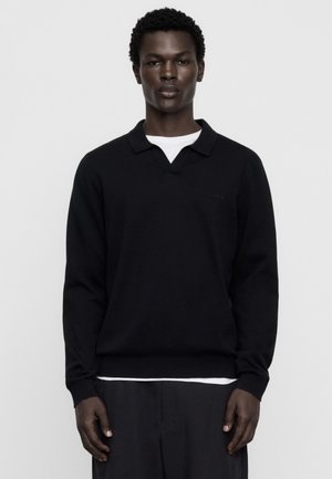 ADOLFO DOMINGUEZ, Stickad tröja - black