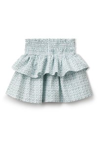 Jupe bleu clair à motifs avec une taille smockée et deux volants superposés, présentant un design de feuilles en bleu foncé et avec des accents verts.