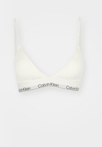 Bela bomba iz bombaža z obliko trikotnih skodelic, tankimi naramnicami in črnim logotipom Calvin Klein na dnu. Gladka tekstura.