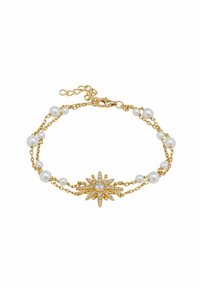 Gold bracelet featuring a starburst charm with clear gemstones and a central stone, interspersed with white pearls and linked chains.