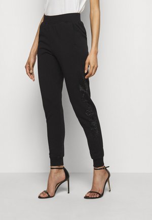 RHINESTONE LOGO PANTS - Teplákové kalhoty - black