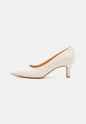 Klassiske pumps - white