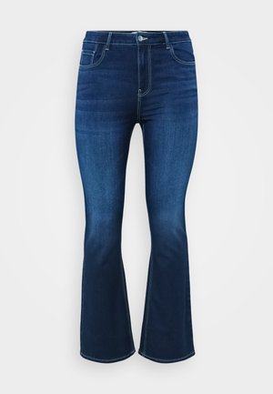 Jeans de campana en azul oscuro, fabricados en denim, que cuentan con un diseño de cinco bolsillos, cremallera con botón y costuras contrastantes a lo largo de las costuras.