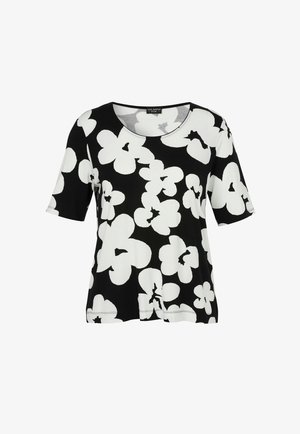 Zwart shirt met korte mouwen met groot wit bloemenpatroon en ronde halslijn.