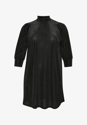 Juoda pleišeta suknelė su aukštu kaklu ir pūstomis rankovėmis. Pagaminta iš tekstūruoto audinio su vertikaliomis juostelėmis. Išlinktas apatinis kraštas.