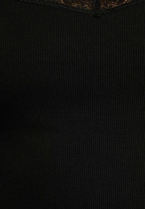 Tessuto a costine nero con delicato bordo in pizzo nero lungo il bordo superiore, che mostra la trama e i dettagli del design.