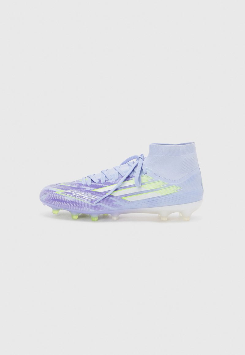Lace-up soccer cleat in light purple with green accents. Features a high collar and patterned design on the upper. Clear studded sole.