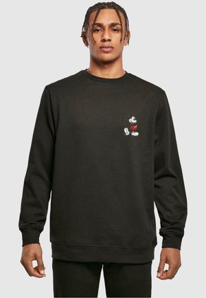 Black sweatshirt featuring a round neck, long sleeves, and a small embroidered Mickey Mouse design in red, white, and black on the chest.