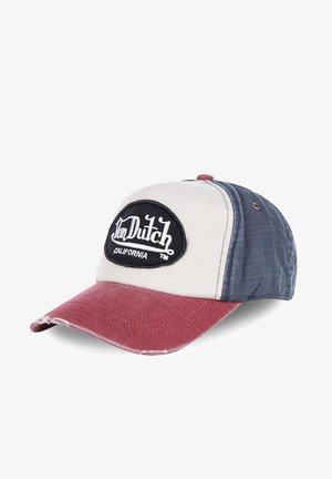 Baseball cap in beige, navy, and red. Features a black embroidered logo patch on the front and a textured fabric design. Distressed edges on the brim.