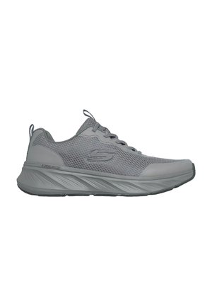 Sneaker sportiva grigia Skechers con tomaia in mesh, chiusura frontale con lacci, suola spessa e testurizzata e logo "S" sul lato.