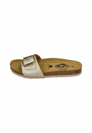 Light beige slide sandal featuring a textured strap with a metallic buckle, cork midsole, and rubber outsole. Soft footbed for comfort.