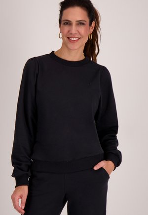 Zwarte sweatshirt van zachte stof, met een ronde hals, geribbelde boorden en zoom, en ballonmouwen voor een ontspannen pasvorm.