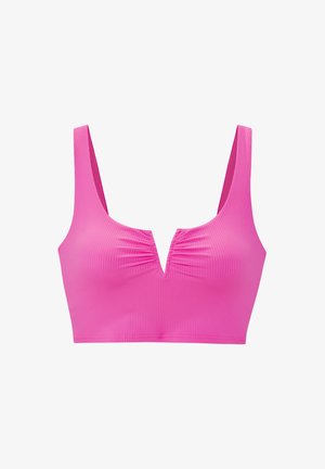 Roze geribbelde bralette met brede bandjes, een V-halslijn met geplooide stof en een gladde, rekbare textuur.