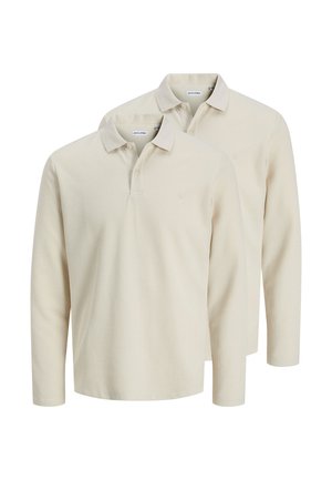Dwa kremowe, długorękawowe koszulki polo z kołnierzykami i listwami z guzikami, przedstawione na tle frontalnym, lekko nałożone na siebie.