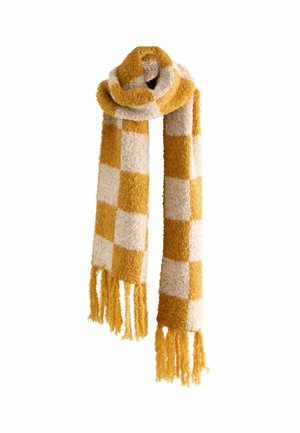 Soft knitted scarf with mustard yellow and cream checkered pattern, loosely wrapped with fringed ends hanging down.