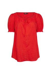 Rote Bluse mit kurzen Ärmeln, rundem Halsausschnitt, strukturierten Punkten und einer Bindegarnitur vorne. Weicher Stoff mit lässiger Passform.