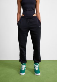 Jordan - PANT - Spodnji deli trenirk - black Miniaturna slika 1