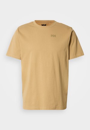 T-shirt in cotone beige chiaro con scollo rotondo, maniche corte e piccolo logo tono su tono sul petto. Tessuto dalla texture liscia.