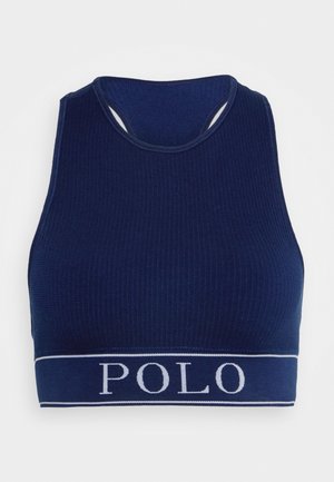 Top corto de canalé azul marino con un escote redondo y diseño de espalda nadadora. Presenta una ancha banda azul marino en la parte inferior con "POLO" en letras blancas.