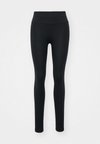 CONTOURING SEAMLESS LEGGINGS - Retuusid - black