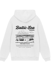 White hoodie featuring a graphic print on the back, displaying "Baltic Sea" in bold text with an illustrated nature scene and text below.