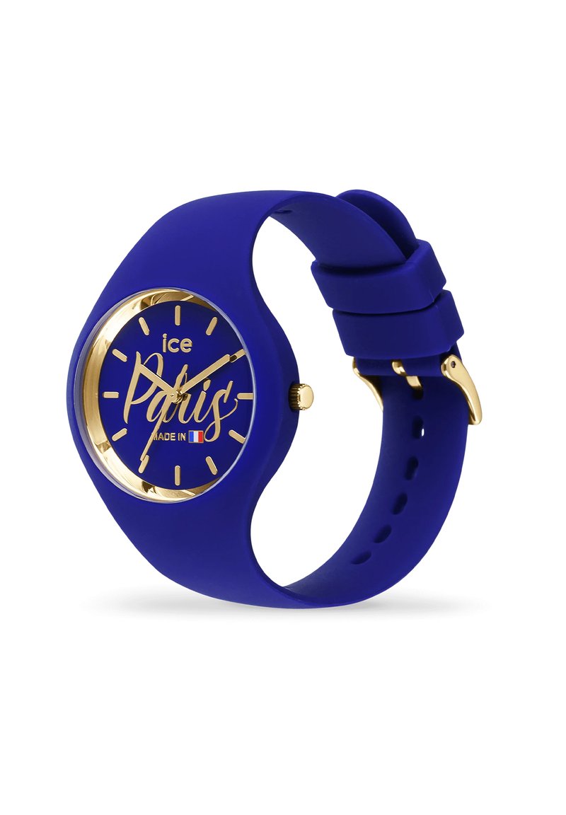 Reloj de silicona azul con acentos dorados. La esfera redonda presenta el texto "ice Paris". Textura suave, correa ajustable con cierre de hebilla.