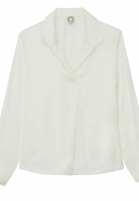 Blouse blanche à manches longues avec un col en V et un tissu lisse. Présente un léger éclat et une coupe décontractée. Pas de motifs ou d'accents visibles.