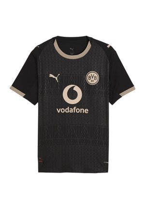 Maillot de football noir avec logo Vodafone beige, marque Puma et écusson BVB 09, présentant un motif géométrique subtil ainsi que des bords de col et de manches rayés.