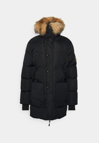 Doudoune noire avec capuche bordée de fourrure, fermeture éclair et boutons-pression, deux poches avant, et poignets côtelés. Texture lisse avec une finition brillante.