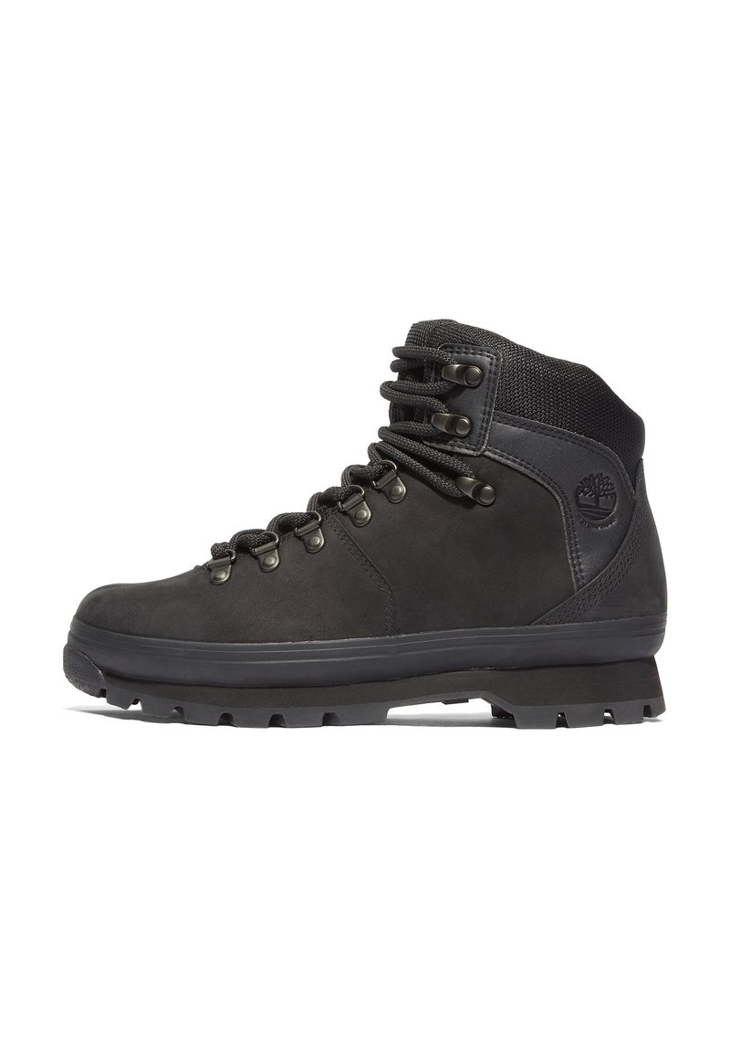 Scarpe da trekking in pelle nera con un colletto in tessuto testurizzato, occhielli in metallo e una suola in gomma robusta con un motivo di trazione.