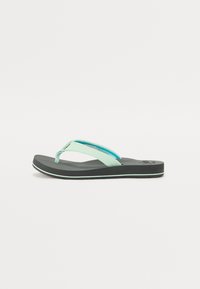 Black flip-flop sandal with a mint green strap, featuring a textured toe post and a cushioned sole with a contrasting light green trim.