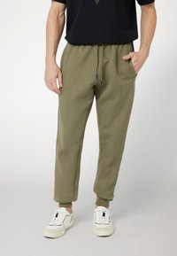 Guess JOGGING SEITLICHES LOGO - Treningo apatinė dalis - verde oliva