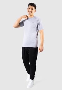 Smilodox TAYLOR - Trainingsbroek - schwarz