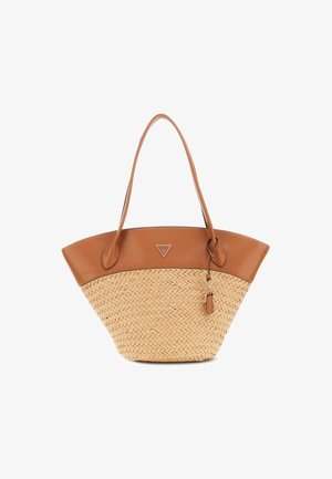 Vävd halmtoffel med bruna läderdetaljer, med en triangular logotyp, långa handtag och en dekorativ kvastdetalj.
