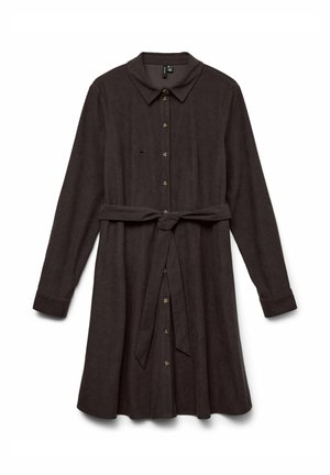 Tamno smeđa haljina s gumbima, ovratnikom, dugim rukavima, remenom u struku i suknjom koja se širi. Ima zlatno obojane gumbe.