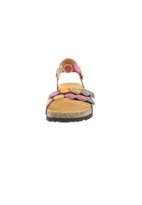 Schwarze Sandale mit bunten, runden Akzenten in Pink, Grün und Orange am Riemen. Verfügt über ein Korkfußbett und eine strukturierte Sohle.