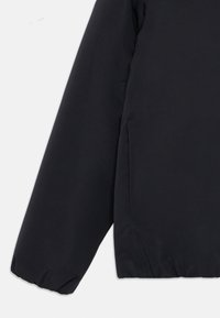 Schwarze Pufferjacke mit einer glatten, matten Oberfläche, elastischen Bündchen und einem leicht abgerundeten Saum. Leichtes und lässiges Design.