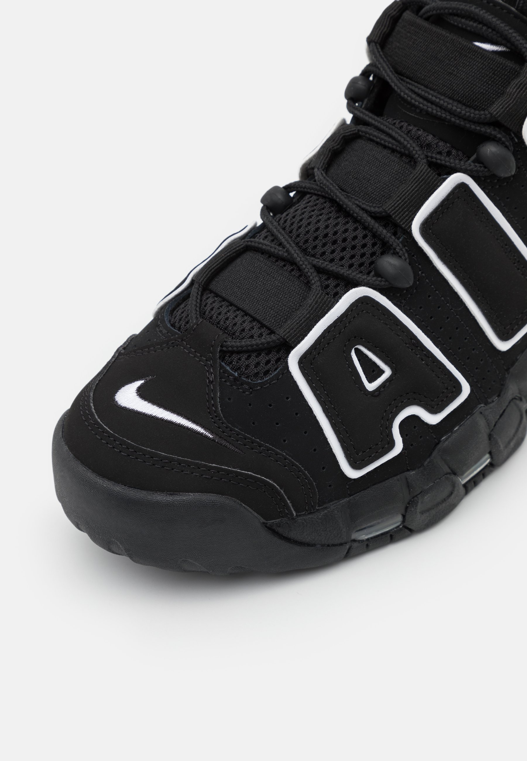 nike uptempo 38.5