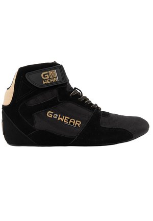 Black high-top sneaker with suede and mesh, gold branding, and black laces. Features a padded collar and prominent side accents.